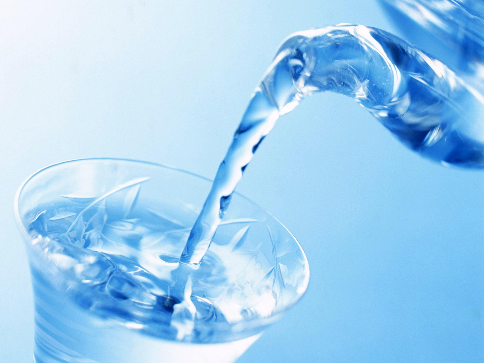 Fresh water pouring into a glass